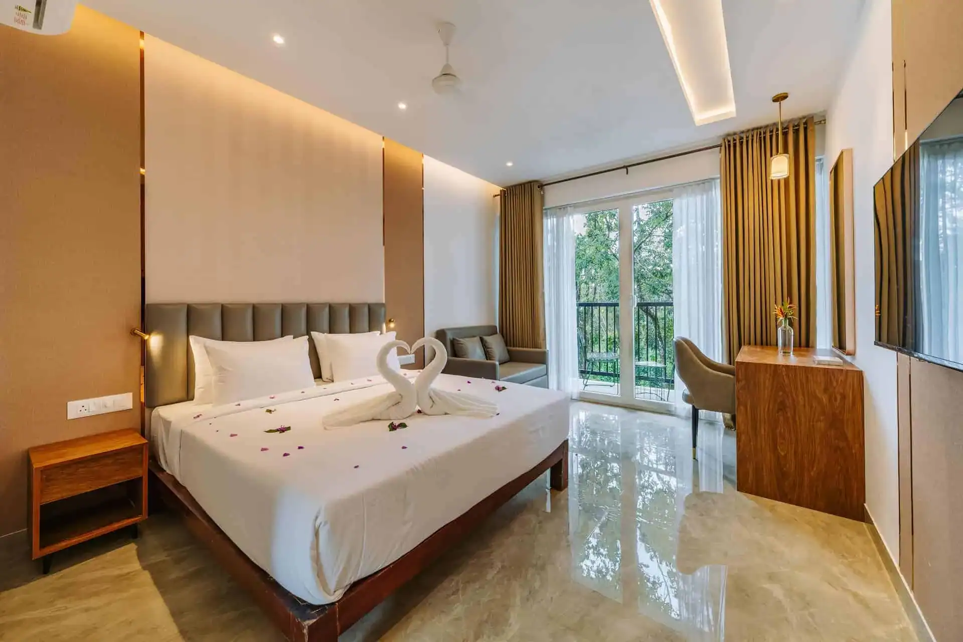 Romantic Vega Bliss Cottage with heart-shaped towel swans on king bed