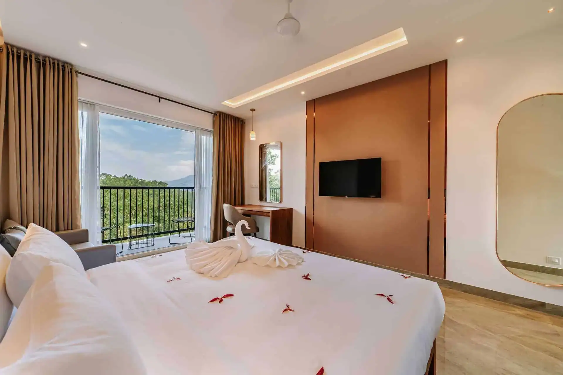 Vega Bliss Cottage with king bed and open balcony showing valley and mountain views